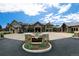 Elegant Columbine Country Club entrance featuring stone signage and architectural details at 5747 S Lowell Blvd, Littleton, CO 80123