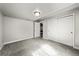 A well-lit room, offering storage with double closet doors at 14632 Longhorn Dr, Mead, CO 80542