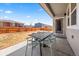 Covered patio with a table and chairs at 14632 Longhorn Dr, Mead, CO 80542