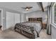 Cozy bedroom with ample natural light, complemented by a comfortable bed and closet at 10869 W 65Th Way, Arvada, CO 80004
