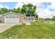 Charming single-Gathering home with a well-manicured lawn, two-car garage, and inviting front garden at 10869 W 65Th Way, Arvada, CO 80004