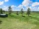 Green grass land and an outbuilding at 1752 Private Road 130, Elizabeth, CO 80107