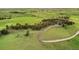 Aerial view of a large property showing boundary lines, a house, and trees on a large field at 1752 Private Road 130, Elizabeth, CO 80107