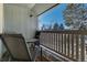Balcony with chairs and table offers a relaxing outdoor space at 1180 S Monaco Pkwy # 3, Denver, CO 80224