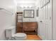 Bathroom featuring vanity with mirror, and coat rack at 1180 S Monaco Pkwy # 3, Denver, CO 80224