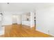 Bright and airy living room, featuring hardwood floors and a large open layout at 1180 S Monaco Pkwy # 3, Denver, CO 80224