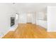 Cozy living room featuring a fireplace, hardwood flooring, and lots of natural light at 1180 S Monaco Pkwy # 3, Denver, CO 80224