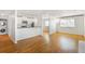 Open-concept living space that blends the kitchen, dining, and living areas seamlessly at 1180 S Monaco Pkwy # 3, Denver, CO 80224
