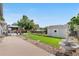 Expansive backyard with a fountain, gazebo, storage shed, and play area at 7132 Xavier Way, Westminster, CO 80030