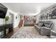 Cozy basement featuring stairs leading to kitchen and modern furniture at 7132 Xavier Way, Westminster, CO 80030