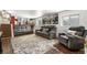 Cozy basement featuring modern furniture, area rug, and natural lighting at 7132 Xavier Way, Westminster, CO 80030