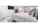 Bedroom with a modern epoxy floor, and comfortable furnishings at 7132 Xavier Way, Westminster, CO 80030