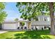 Charming two-story home with a well-manicured lawn and inviting curb appeal on a bright, sunny day at 7132 Xavier Way, Westminster, CO 80030