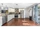 Modern kitchen with stainless steel appliances, hardwood floors, and stylish countertops for a contemporary look at 7132 Xavier Way, Westminster, CO 80030