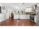 Updated kitchen with stainless steel appliances, hardwood floors, and lots of counter space for cooking and prepping at 7132 Xavier Way, Westminster, CO 80030