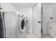 Laundry room featuring modern washer and dryer units at 7132 Xavier Way, Westminster, CO 80030