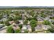 Neighborhood street view, showcasing the property's location amidst mature trees and convenient access to local amenities at 7132 Xavier Way, Westminster, CO 80030