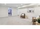 Spacious basement featuring neutral carpet, white walls and trim, and recessed lighting at 207 Iowa Dr, Golden, CO 80403