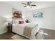 Bright bedroom with warm decor and a window offering natural light and outdoor views at 207 Iowa Dr, Golden, CO 80403