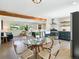 Eat-in kitchen open to living room boasts updated appliances and natural light at 207 Iowa Dr, Golden, CO 80403