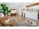 Bright living room with hardwood floors, fiddle leaf fig, and an open concept design at 207 Iowa Dr, Golden, CO 80403