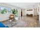 Open-concept living area with hardwood floors, natural light, and a comfortable seating area at 207 Iowa Dr, Golden, CO 80403