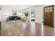 Bright and airy living room featuring hardwood floors, large windows, and a stylish design at 207 Iowa Dr, Golden, CO 80403