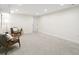 Spacious living room with neutral carpet and light-filled area has modern furniture at 207 Iowa Dr, Golden, CO 80403