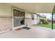 Back porch featuring sliding glass doors and outdoor access at 3026 S Alton Ct, Denver, CO 80231