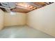 Unfinished basement with exposed ceiling and concrete floor offers a blank canvas for your creative vision at 3026 S Alton Ct, Denver, CO 80231