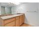 Bathroom featuring a large vanity and walk-in shower at 3026 S Alton Ct, Denver, CO 80231