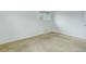 Bedroom with neutral carpet, white walls, and a window providing natural light at 3026 S Alton Ct, Denver, CO 80231
