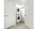 Convenient laundry area with stacked washer and dryer units at 4394 Zenobia St, Denver, CO 80212