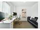 Bright home office with modern desk, comfortable seating, and ample natural light at 4394 Zenobia St, Denver, CO 80212