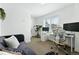 Comfortable office space with couch and large windows at 4394 Zenobia St, Denver, CO 80212