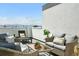 Outdoor rooftop deck featuring mountain view with open sky and comfortable seating at 4394 Zenobia St, Denver, CO 80212