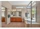 Bright bathroom features a soaking tub, double vanity, and plenty of natural light at 7211 Dolomite Ln, Castle Rock, CO 80108