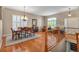 Elegant dining room featuring hardwood floors, plantation shutters, and classic furnishings at 7211 Dolomite Ln, Castle Rock, CO 80108