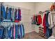 Spacious walk-in closet has ample shelving and hanging space for optimal organization at 7211 Dolomite Ln, Castle Rock, CO 80108