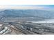 Aerial view of mountains in the distance and complex of highways and overpasses at 4286 S Cole St, Morrison, CO 80465