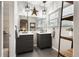 Beautiful bathroom featuring dual sinks, modern fixtures, and tile flooring, offering style and functionality at 4286 S Cole St, Morrison, CO 80465