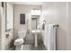 This convenient bathroom is equipped with modern fixtures, grab bars, and towel racks at 4286 S Cole St, Morrison, CO 80465