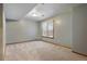 Cozy bedroom with neutral carpet, light-gray walls, and a window letting in natural light at 4286 S Cole St, Morrison, CO 80465