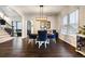 Formal dining room featuring modern lighting, hardwood floors, and an open layout at 4286 S Cole St, Morrison, CO 80465