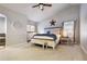 Spacious main bedroom features vaulted ceilings, a ceiling fan, and abundant natural light at 4286 S Cole St, Morrison, CO 80465