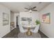 Modern dining room with a round table, stylish chairs, and contemporary decor at 1273 S Gilbert St # A103, Castle Rock, CO 80104