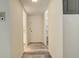 Inviting hallway featuring wood-look flooring and access to various rooms at 7255 E Quincy Ave # 403, Denver, CO 80237