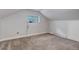 Neutral carpeted room with a window and baseboard heating; ready for personalization at 1324 Virginia St, Idaho Springs, CO 80452