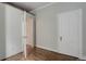 A bedroom has hardwood floors and two entryways at 1324 Virginia St, Idaho Springs, CO 80452