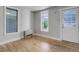 Cozy living room with hardwood floors and lots of natural light at 1324 Virginia St, Idaho Springs, CO 80452